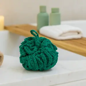 Round Green wool yarn loofah with crocheted texture and hanging loop